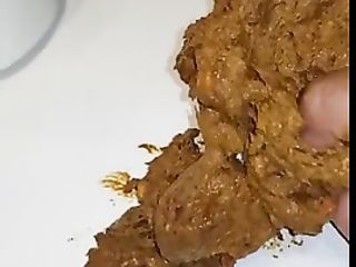 Man Plays With His Shit After Pooping On Top Of The Toilet