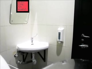 Sexy Brunette With Fantastic Ass And Thigh Gap Shits In The Sink