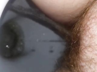 Girl With Bushy Ginger Pussy Pisses A Hard Stream And Shits For Us On Cam