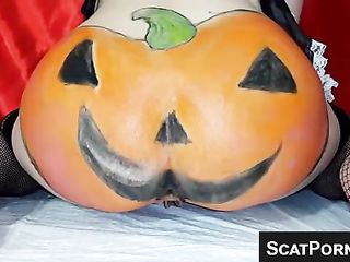 Halloween Pumpkin Ass Shits For Us On Webcam While She Drips Discharge Out Of Her Pussy