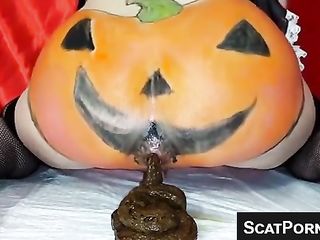 Halloween Pumpkin Ass Shits For Us On Webcam While She Drips Discharge Out Of Her Pussy