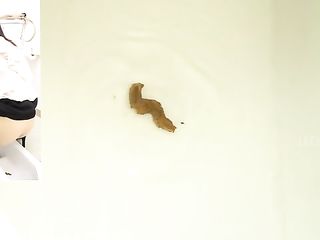 Tiny Asian Chick In Heels Drops A Massive Load Of Shit