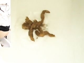 Tiny Asian Chick In Heels Drops A Massive Load Of Shit