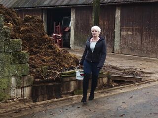 Glamour girl gets completely covered in cowshit