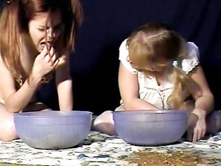 Two Girls Binge Eat and Purge in Big Bowls on Webcam