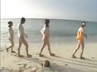 Asian Girls Shit On Girlfriend At The Beach She's Buried In The Sand And Helpless